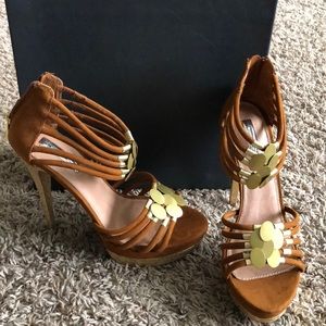 Brown and gold heels
